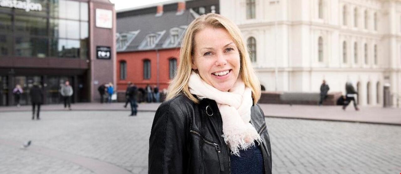 Person som smiler til kamera