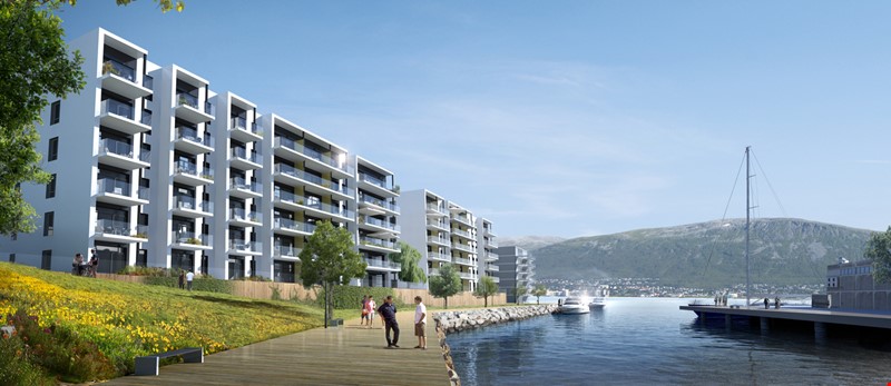 Boligblokk som ligger nær en kai