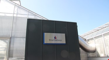 Et nærbilde av en bygning som står "SmartTekEnergi" på